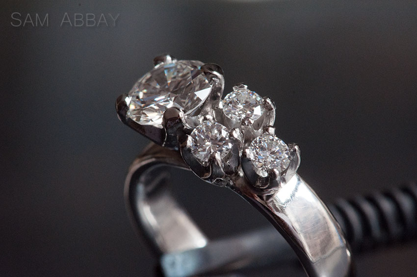 Platinum 4-stone engagement ring asymmetrical