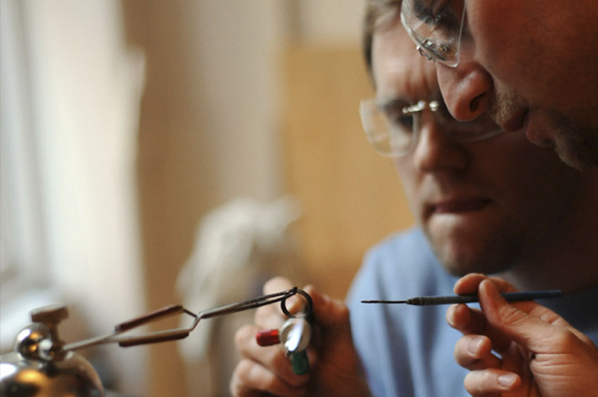 Sam Abbay teaches soldering - photo by Ali Smith