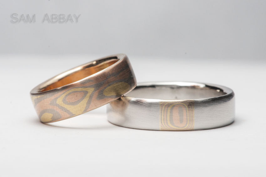 White, yellow, and red gold mokume gane rings