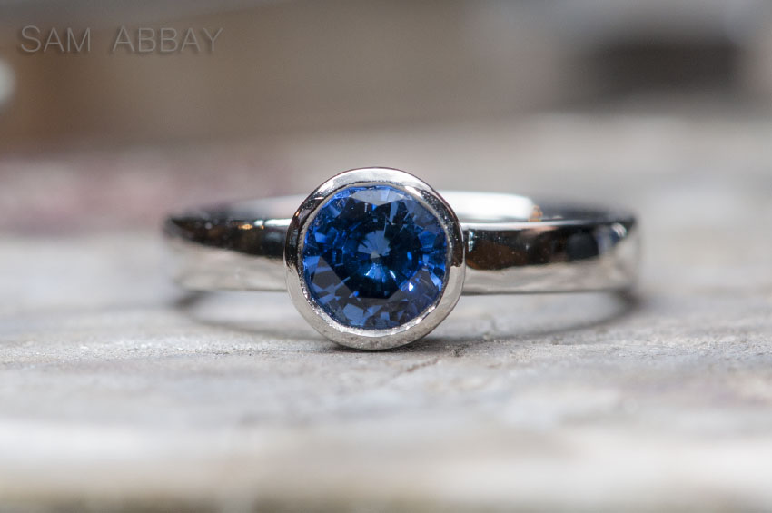 platinum sapphire bezel engagement ring